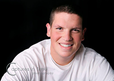 close up of senior boy in white shirt Kansas City