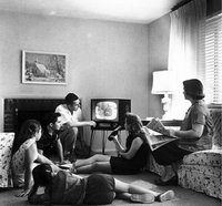 [Family_Watching_TV_in_the_1950s.jpg]