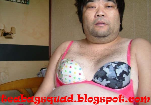[fat_guy_with_man_in_homemade_mismatched_bra.jpg]