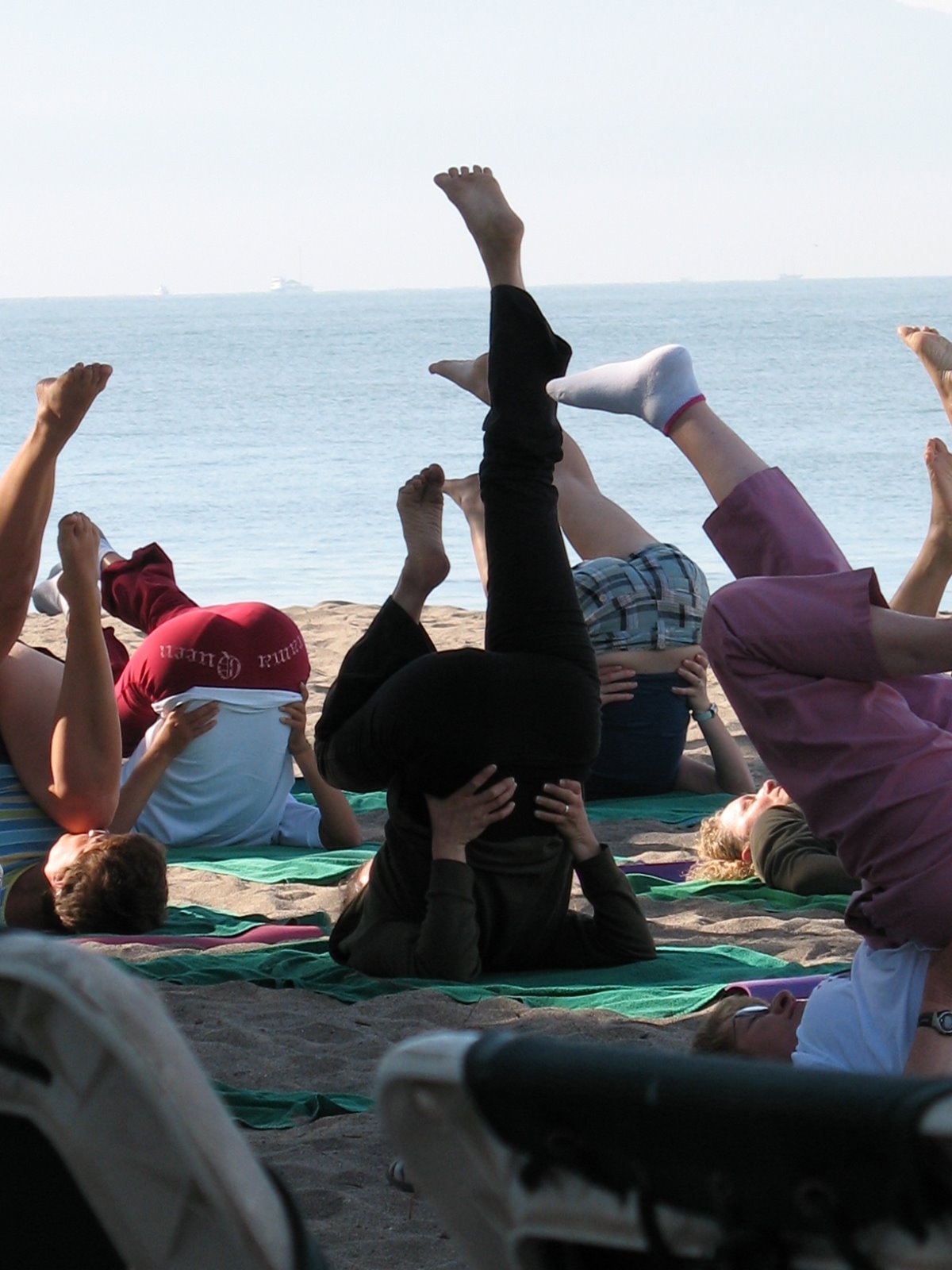 [jen+doing+yoga+on+beach.jpg]