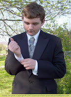 Isaac dressed in prom tux