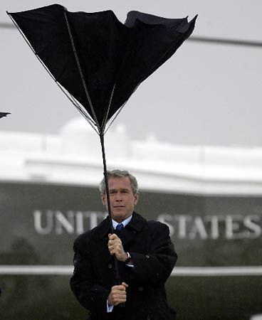 [george_w_bush_goofy_inside_out_umbrella.jpg]