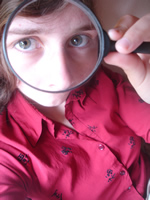 [magnifying+glass+and+woman+small.jpg]