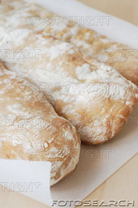[loaves-of-ciabatta-bread-close-up-~-73346582.jpg]