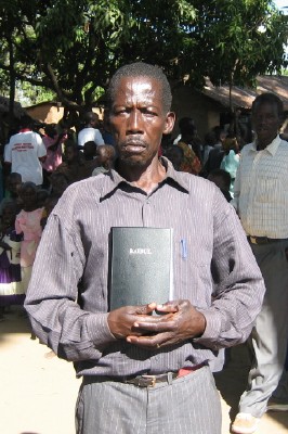 [pastor_with_bible_uganda.jpg]