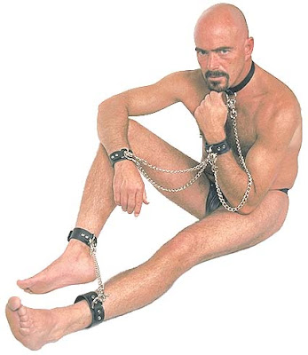 Naked man with leather straps