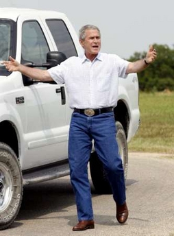 [Bush+&+his+shiny+white+pickup+&+his+big,+big+belt+buckle.jpg]