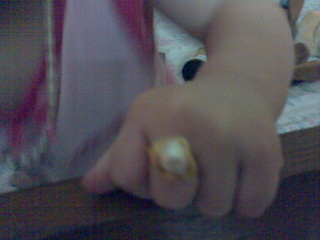 [baby+with+ring.jpg]