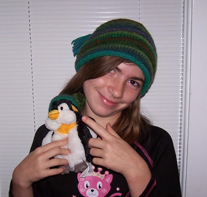 [girl+and+her+hat+and+her+penguin.jpg]