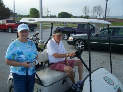 [mom+and+dad+golfing.jpg]