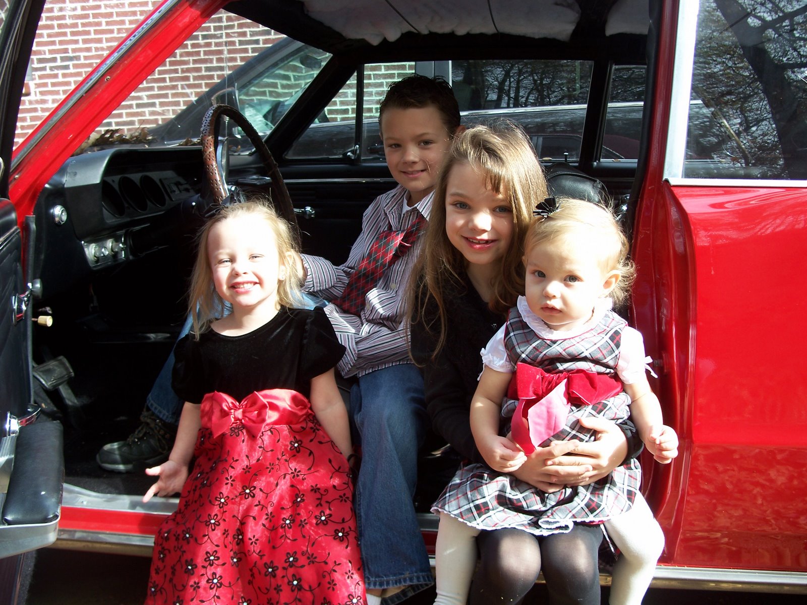 4 of my favorite people in my wonderful Granddad's old car!