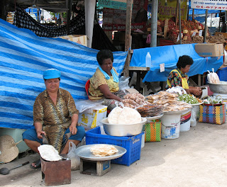 Snacks for sale - roti, cashew nuts and khanom