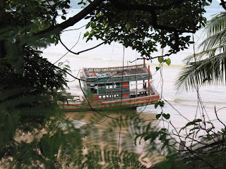 Old beached fishing boat at the west end of Rawai beach