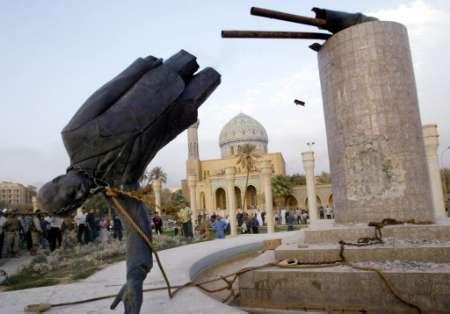 [Saddam+statue+falls+-+Reuters.jpg]