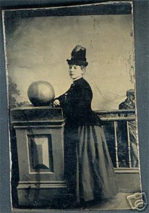 [medicine+ball+-+6th+plate+tintype+of+a+lady+posed+beside+a+large+medicine+ball.JPG]