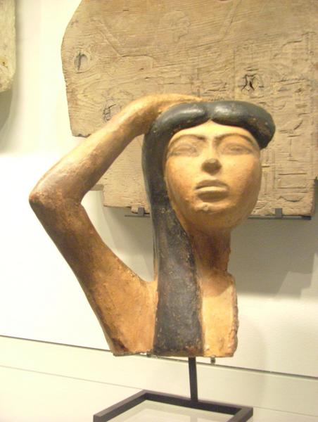 [Egyptian_ceramic_statue_in_the_Louvre.med.jpg]