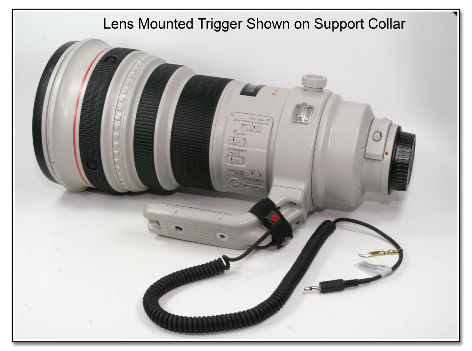 Lens Mounted Trigger Cable Wrapped around Support Foot of Lens