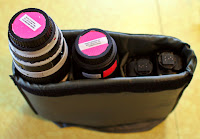 a bag with several camera lenses