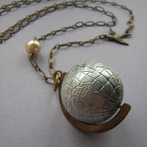 [globe+necklace.jpg]