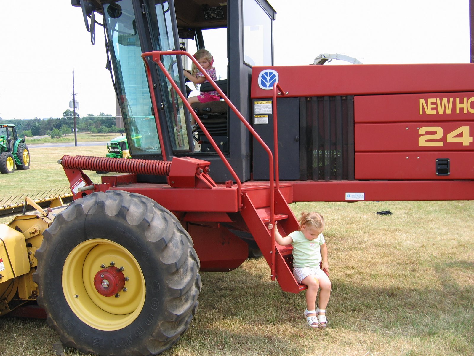 [Little+girls+on+big+tractor.JPG]