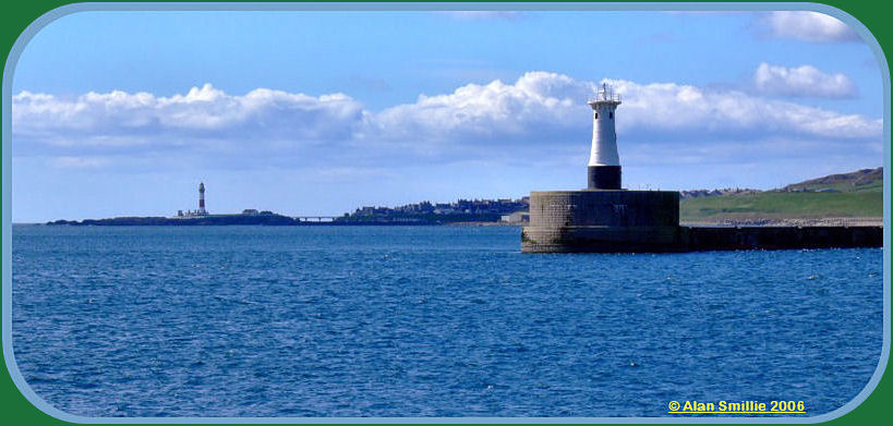 Peterhead's South Breakwater with Buchanness Lighthouse in the background.