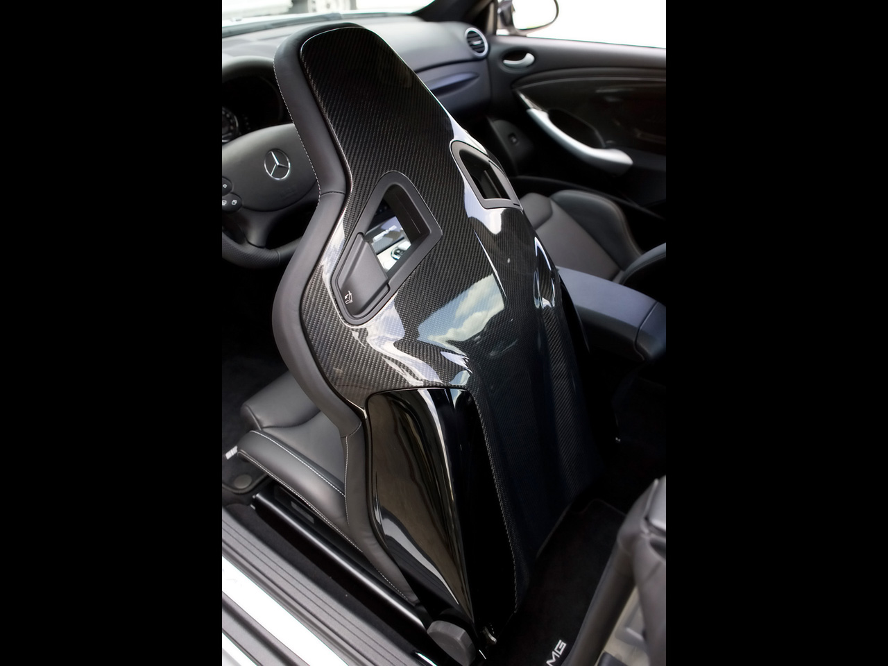 [2008-Kicherer-Mercedes-Benz-CLK-63-AMG-Black-Edition-Carbon-Fiber-Sport-Seat-4-1280x960.jpg]