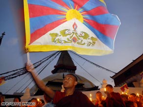 [TibetanFlagProtest.jpg]
