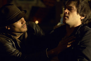 Still image of Aaron and his blood brother Moses in Dreamland, from the film (Margate) Exodus