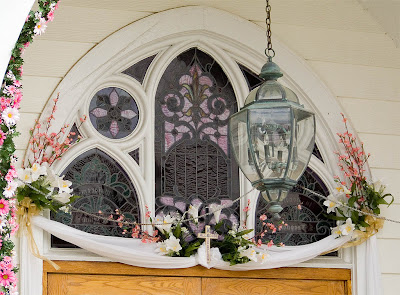 Saint Theodore Roman Catholic Church, in Flint Hill, Missouri, USA - decorated window over front door