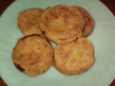 fried green tomatoes on plate.