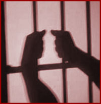 [criminal behind bars.jpg]
