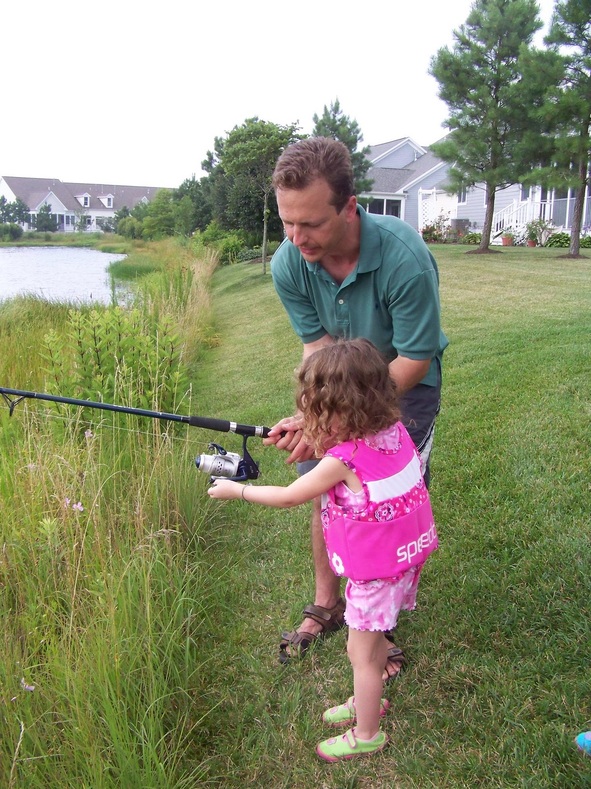 [7-8-08_21+Kayla+fishing+with+Uncle+Jason.jpg]