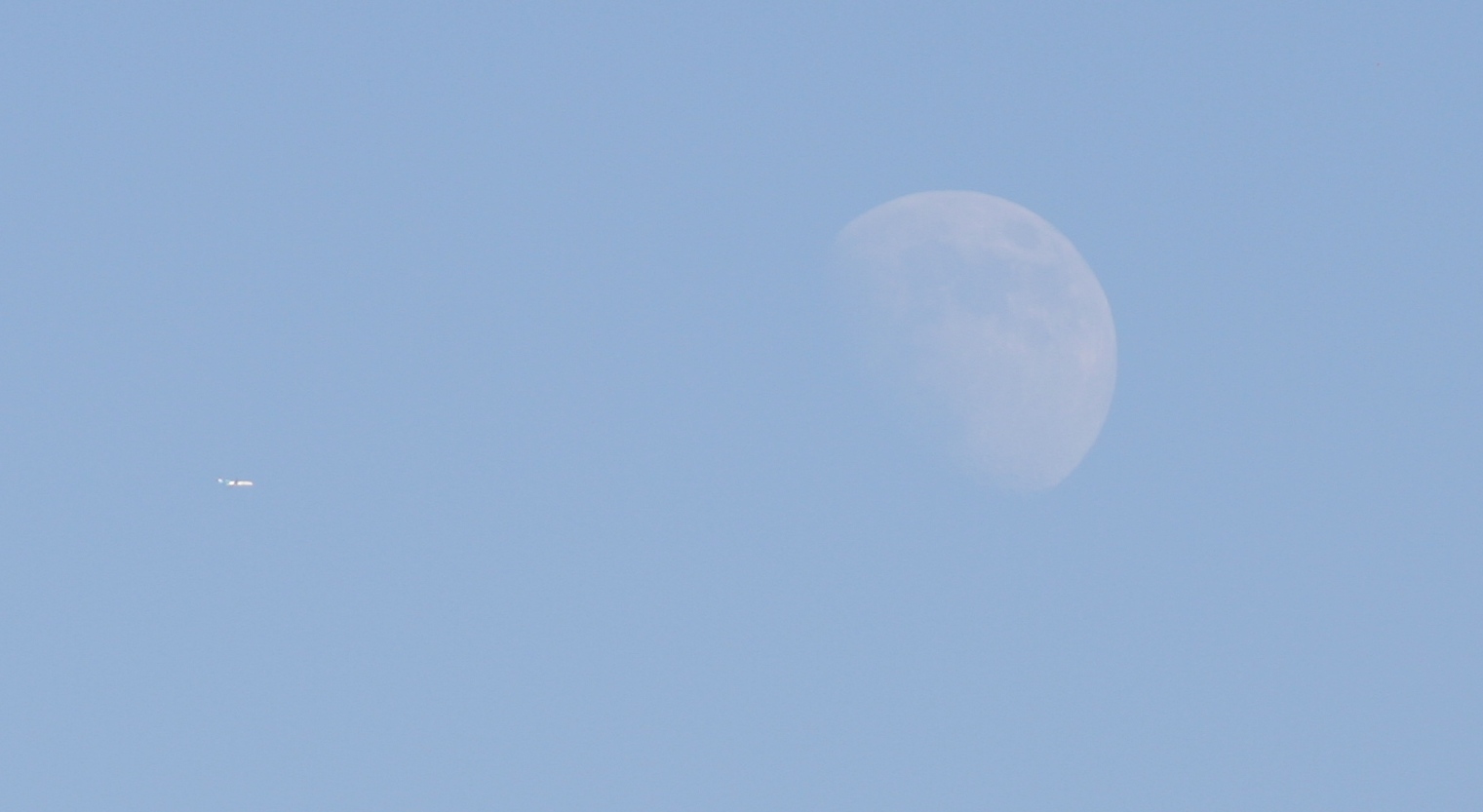 [Moon+and+plane.jpg]