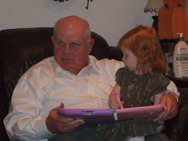 Abbie and Papa Reading a book