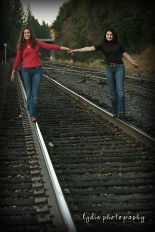 Sisters on the railroad tracks at lifestyle sister portraits in Colfax, California
