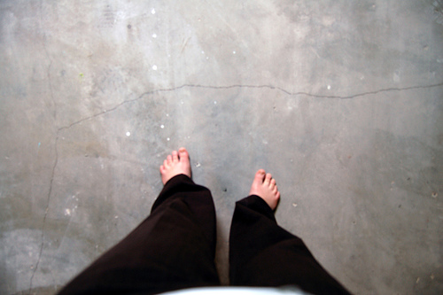 [feet+on+concrete.jpg]