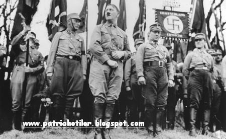 [hitler18-Adolf+Hitler+leads+an+SA+unit+in+a+Nazi+Party+parade+in+Weimar.+(1931).jpg]