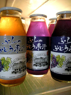 Some Hokkaido grape juice in glass bottles.