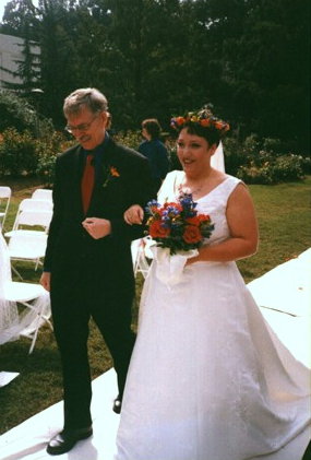 [laura+and+dad+down+the+aisle.jpg]