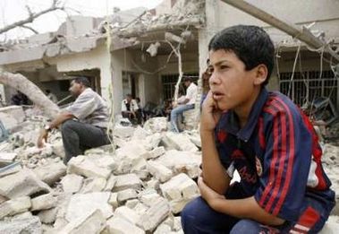 [20070530_boy_ruins_of_home_day_after_al_amil_husseiniya_bombing.jpg]