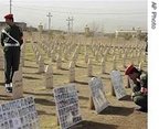 [AP_Kurdish_soldiers_stand_in_the_graveyard_in_Halabja_eng_195_16mar08.jpg]