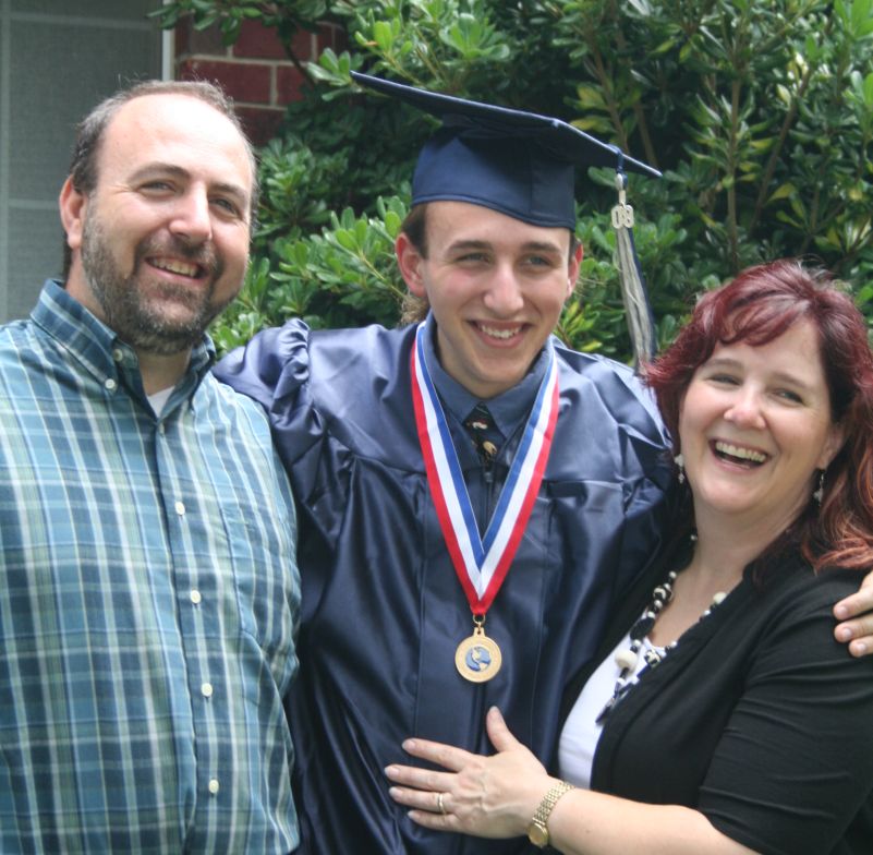 [Grad+with+Mom+and+Dad.jpg]