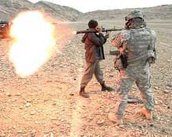 [250px-Afghan_National_Police_officer_fires_an_RPG_round_at_a_special_mission_conducted_by_US_Army.jpg]