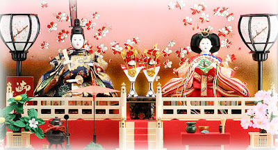 This photo is two dolls representing the Emperor (お内裏様 O-Dairi-sama) and Empress (お雛様 O-Hina-sama)