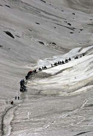 [Thousands+of+Hindus+trek+annually+to+cave+-Amarnath+-Himalayan+mountains+12,500+feet+where+they+worship+ice+formation.jpg]