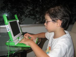 Victor playing with the OLPC