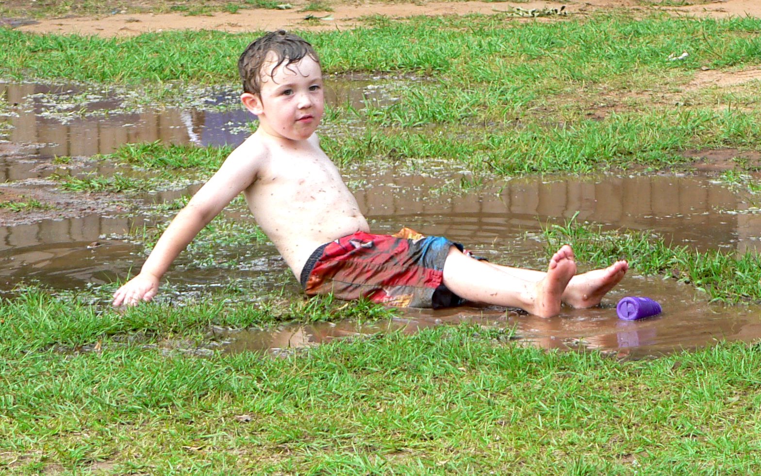 [little+boy+layin+in+mud+puddle.jpg]