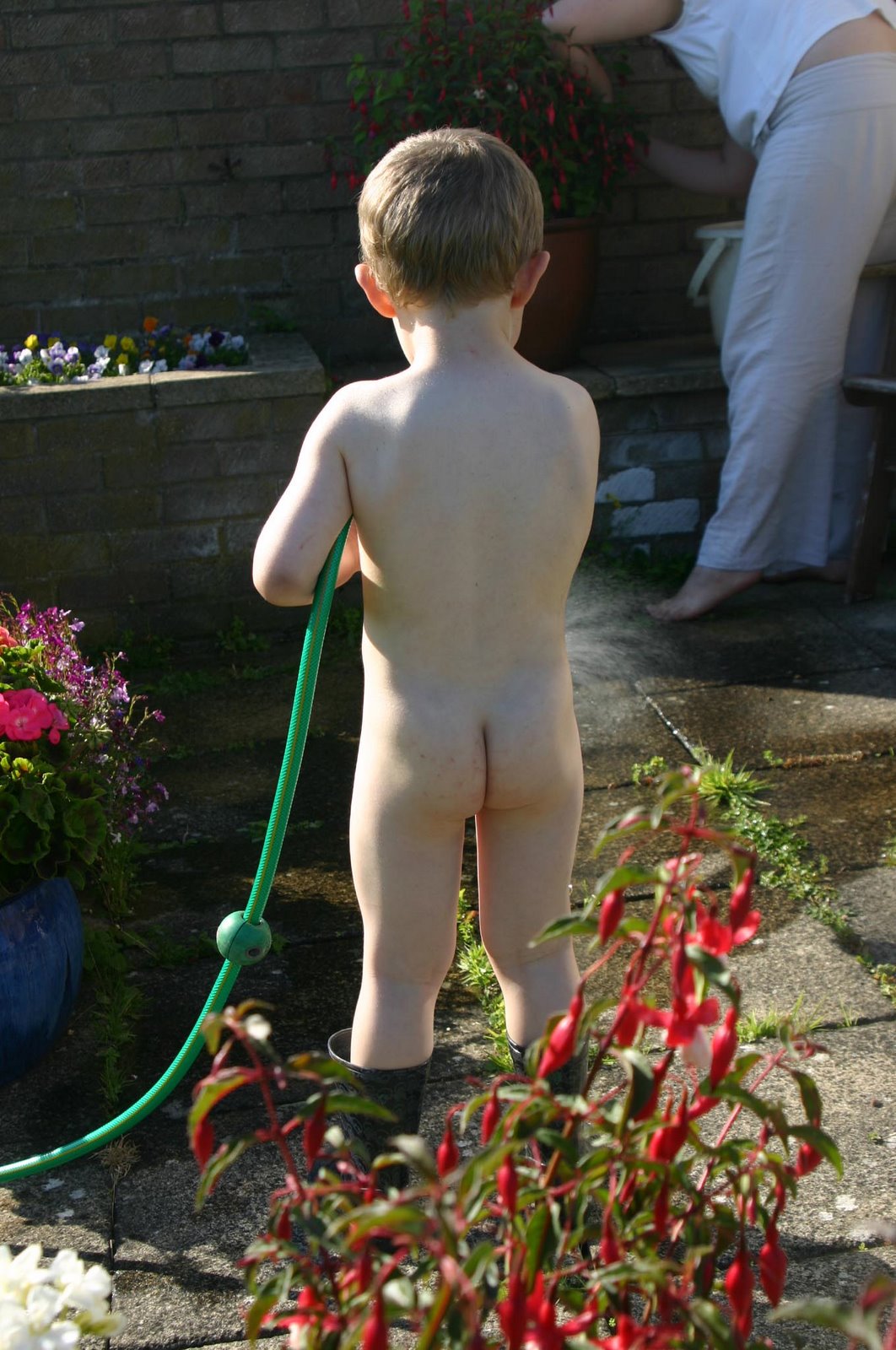 [Watering+the+flowers+and+Mummy.jpg]