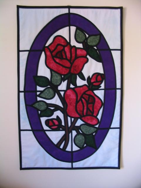 [rose+stained+glass+quilt.jpg]