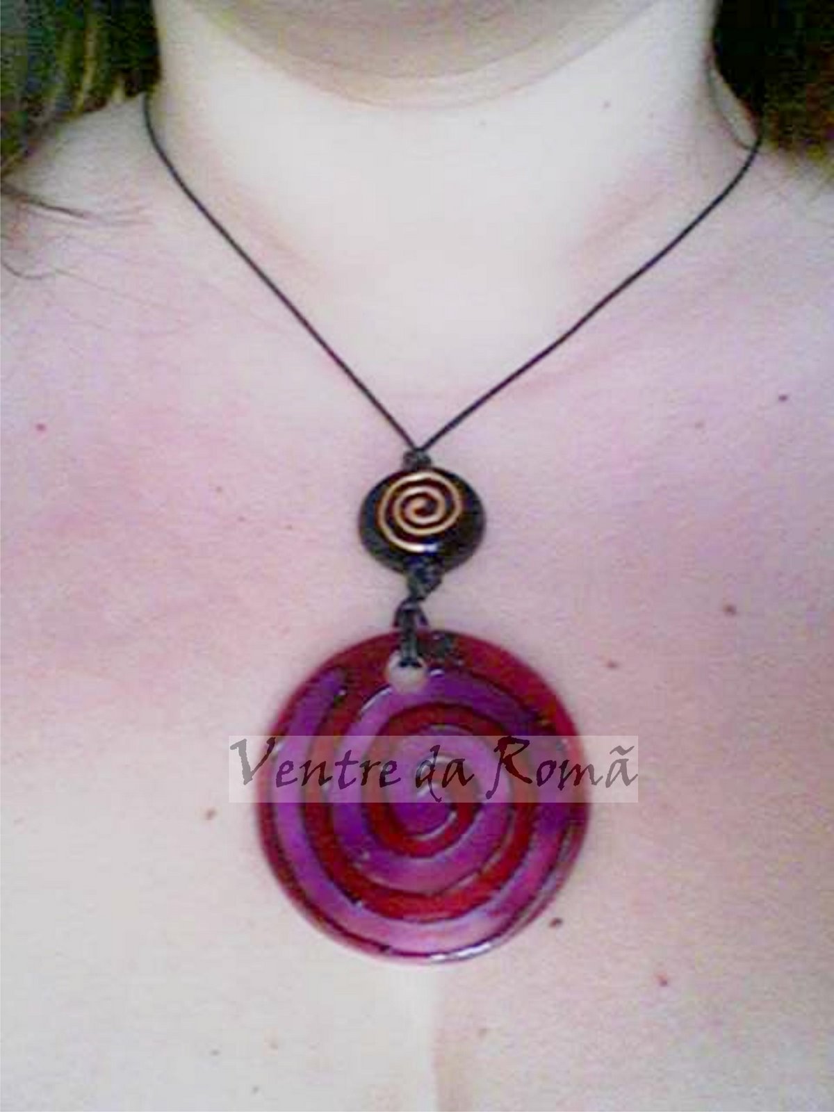 [amuleto+espiral+rosa+e+lilás.jpg]